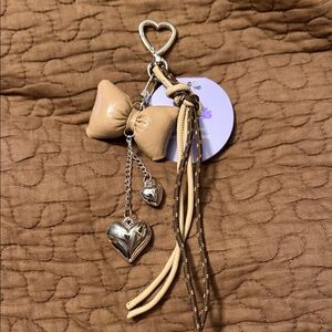 Claire’s Bow & Heart Bag Charm NWT retails $13